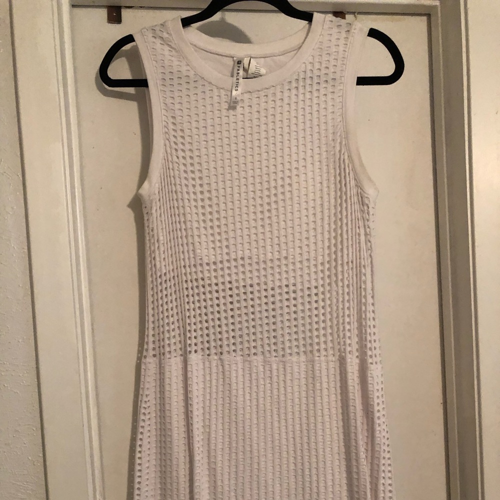 Sleeveless white illusion mini-dress
